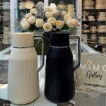 فلاسک شیشه صورتی برند orive الف هردو رنگ کرم و مشکی