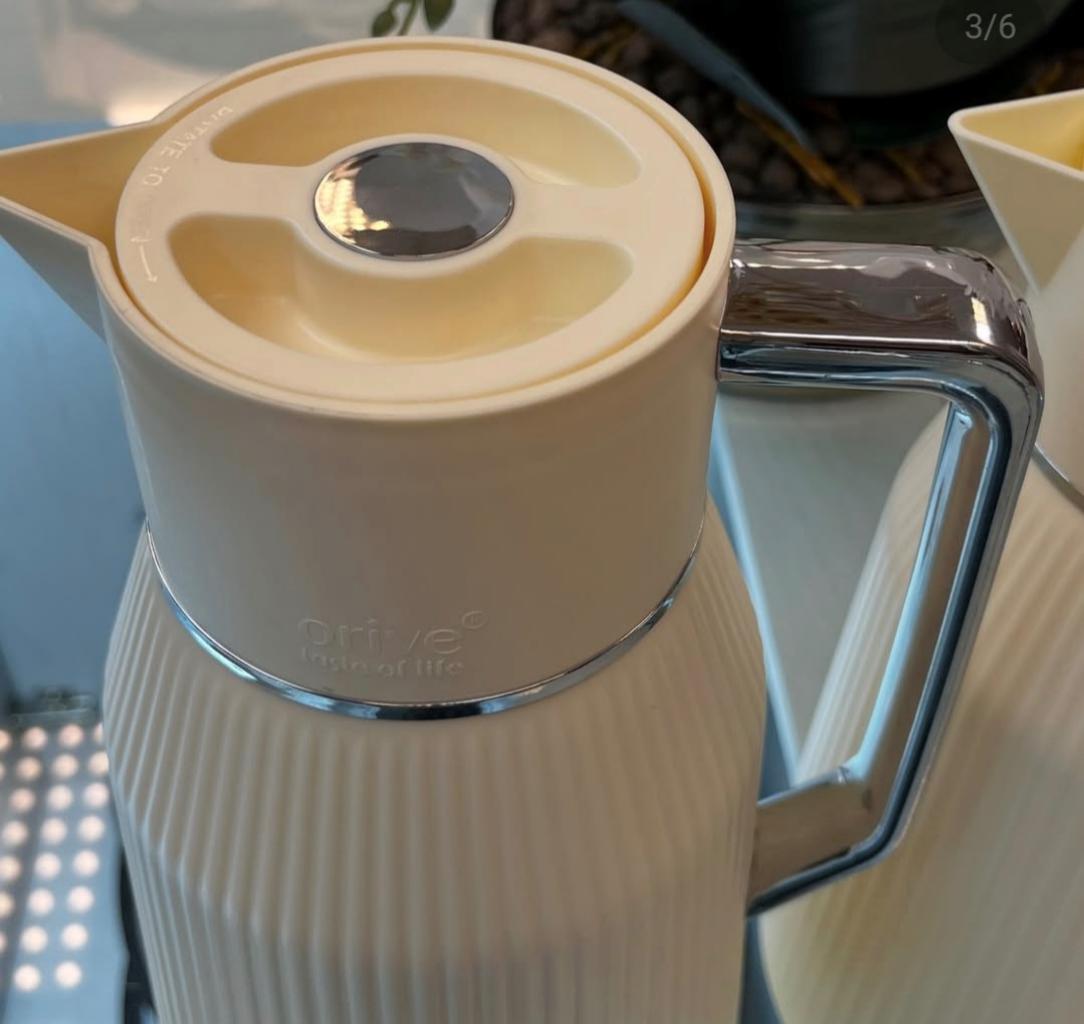 فلاسک شیشه صورتی برند orive ج دسته و درب