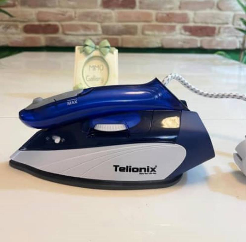 اتو مسافرتی برند تلیونیکس Telionix از نمای بغل با دسته بسته