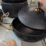 سرویس قابلمه 10 پارچه هاناتک درب فلزی با دسته های طلایی ه